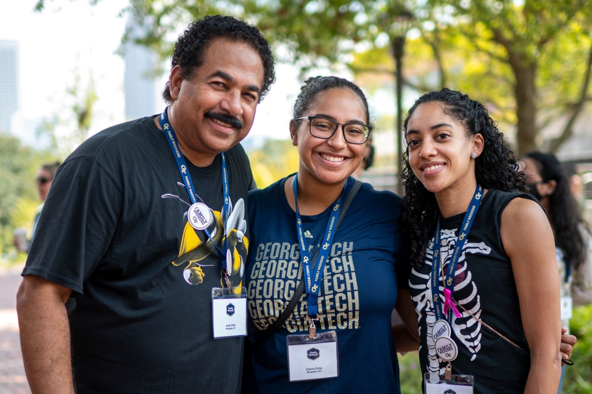 Gt family of 3: man, woman and female student